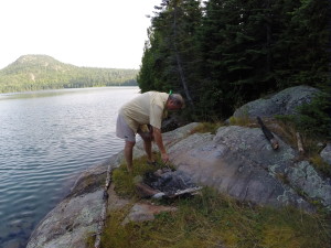 August 14 Putting out a small campfire on the shore of Brule