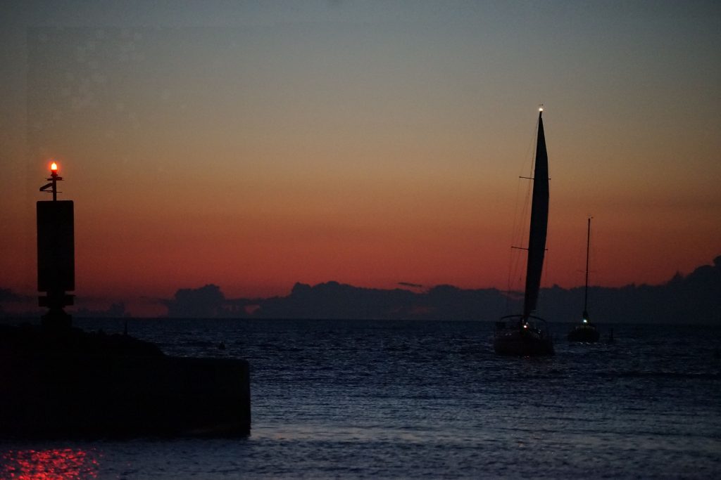 Sailboats arriving at sunset - Port Elgin Ontario